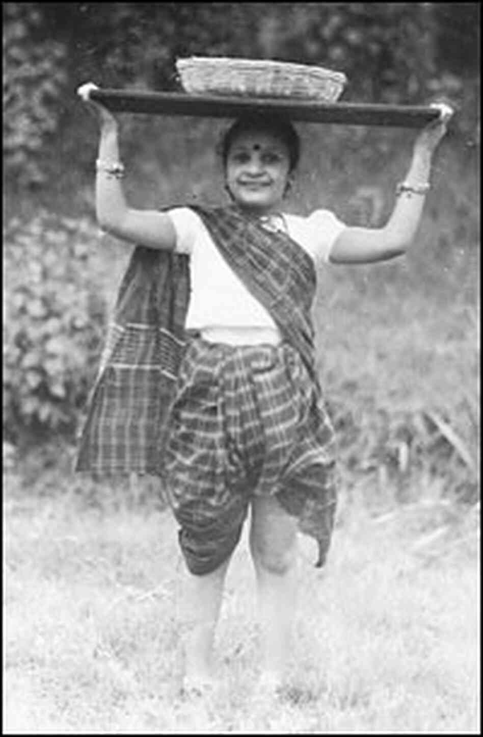 Niloufer Ichaporia King at age six, dressed as a Koli fisherwoman.
