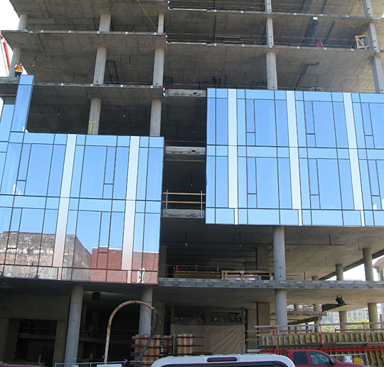 A building under construction in Portland, Ore., will have an energy-efficient glass facade.