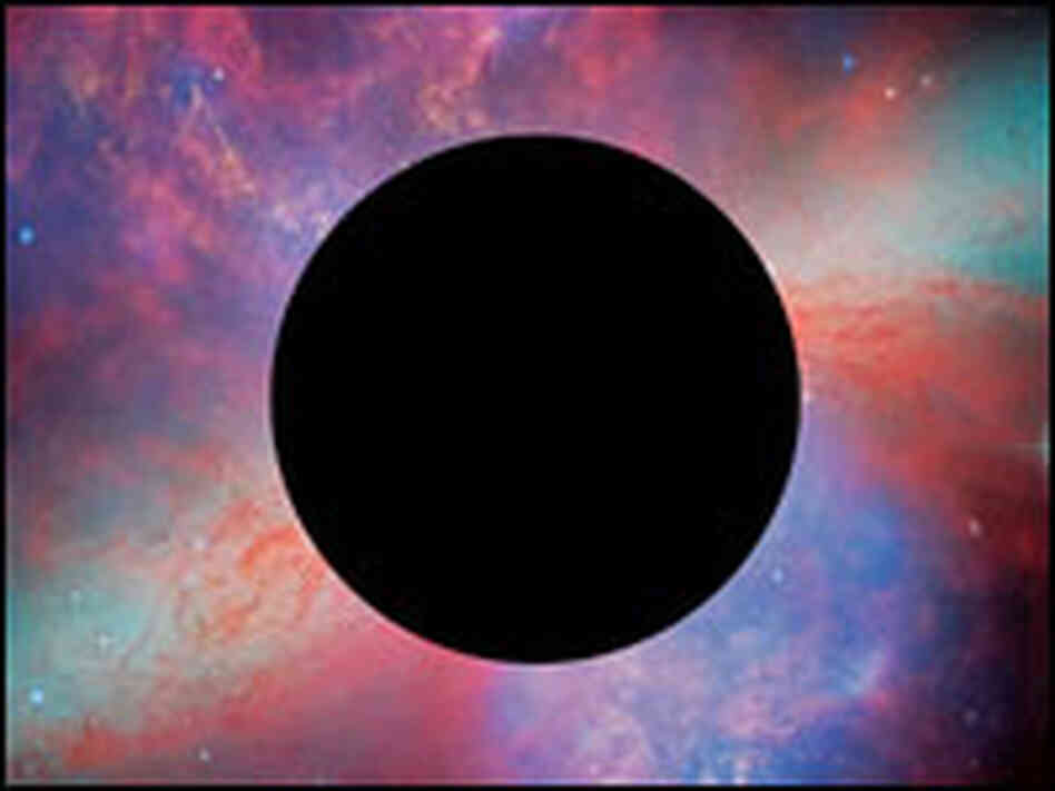 A "black hole" is superimposed on an image from the Hubble Space Telescope.