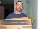 Robert Hart picks up food for his wife and three children. Robert Hart picks up food for his wife and three children.