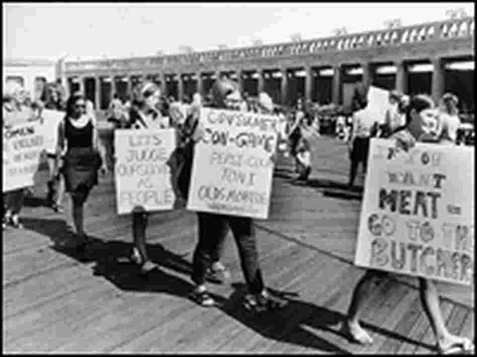 Demonstrators from the National Women's Liberation Party picket with signs