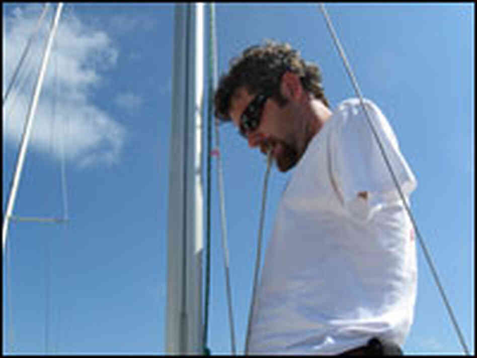 Tim Angle uses his teeth to tie knots.
