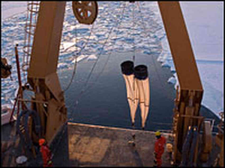 Icebreaker ship goes through Chukchi Sea.