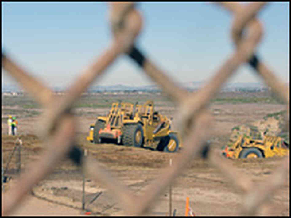 Bulldozer working on the U.S. side of the border.
