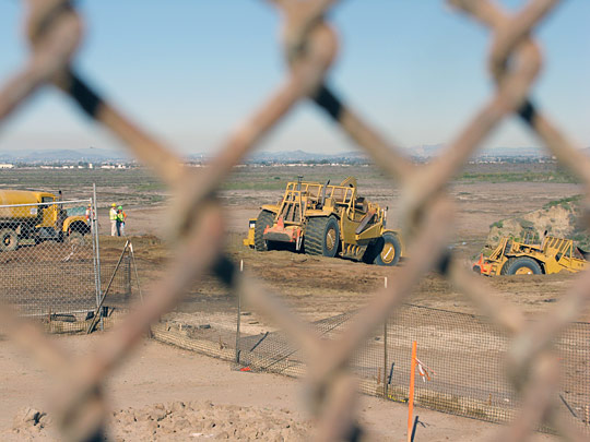 Bulldozer working on the U.S. side of the border.