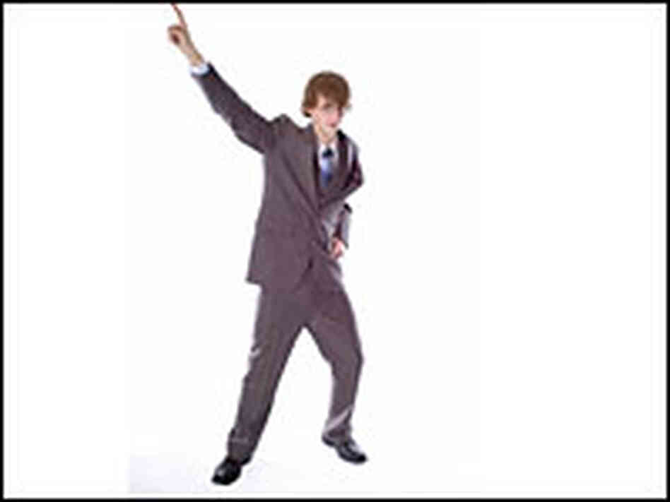 A worker strikes a 'Saturday Night Fever' pose on a Monday morning A worker strikes a 'Saturday Night Fever' pose on a Monday morning