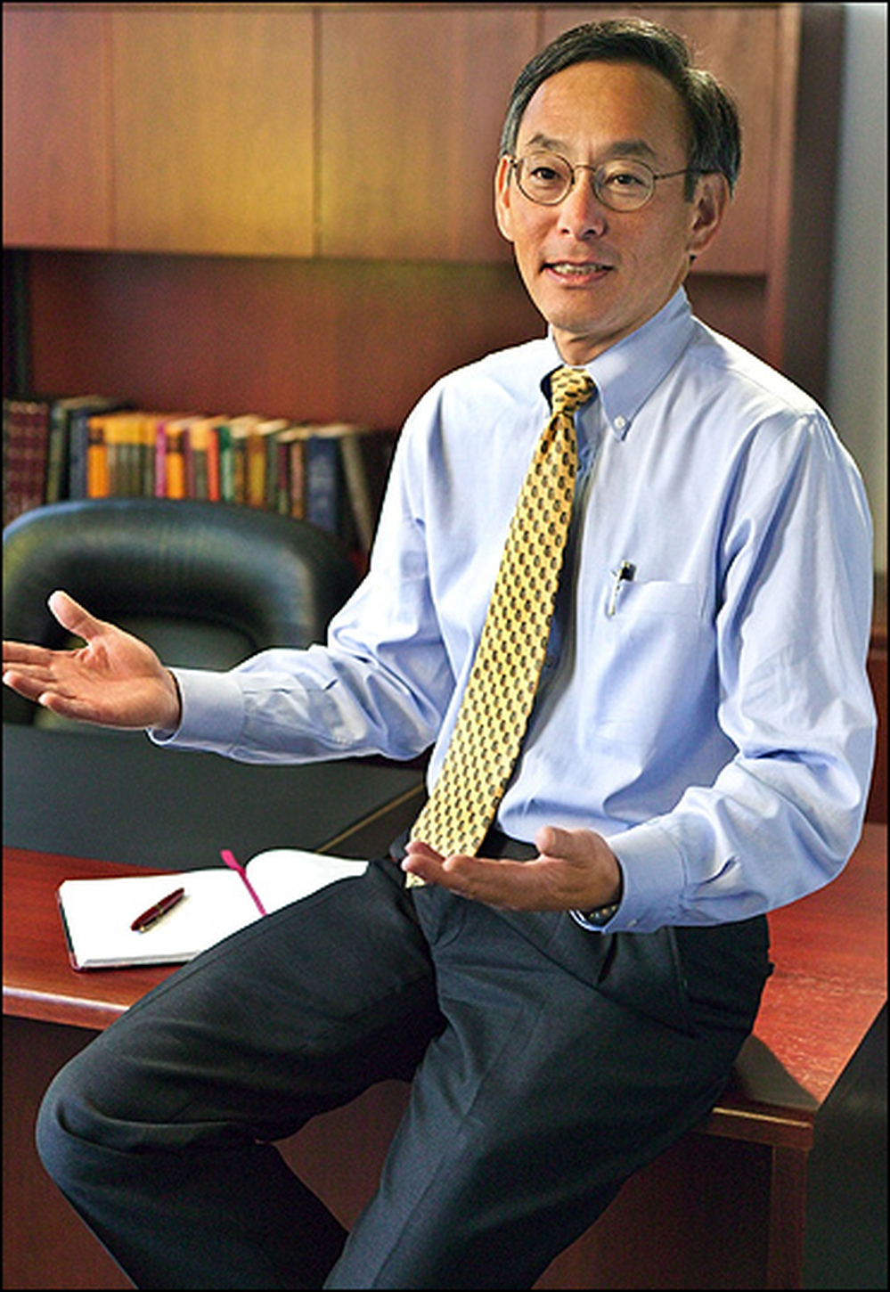 Steven Chu sits in an office.