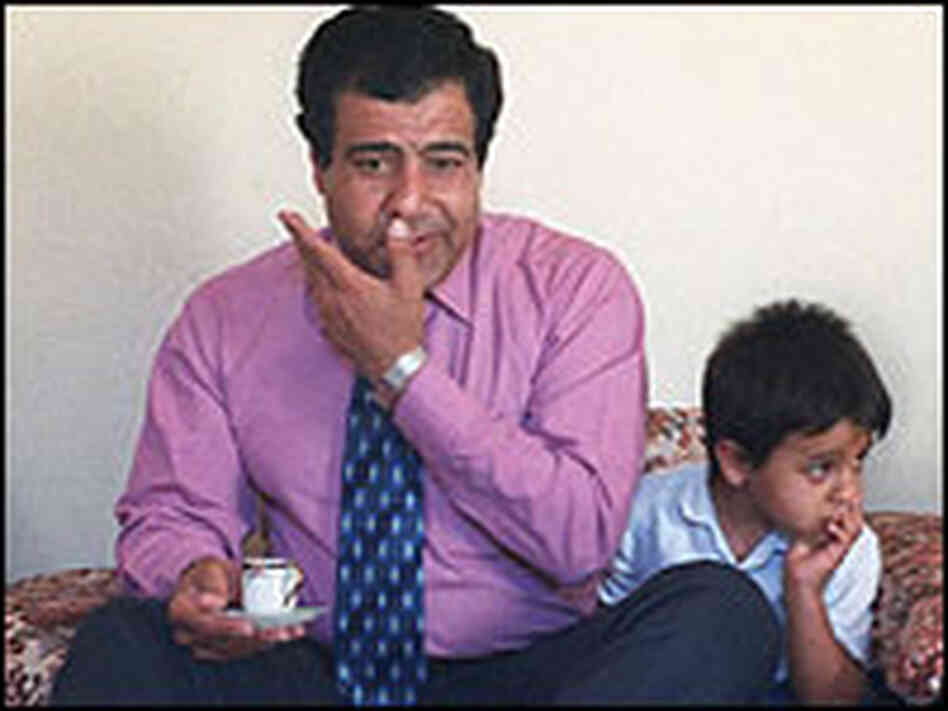 Dr. Izzeldin Abuelaish and his son Muhammed sit at his home in the Gaza Strip in this 2001 photo. Dr. Izzeldin Abuelaish and his son Muhammed sit at his home in the Gaza Strip in this 2001 photo.