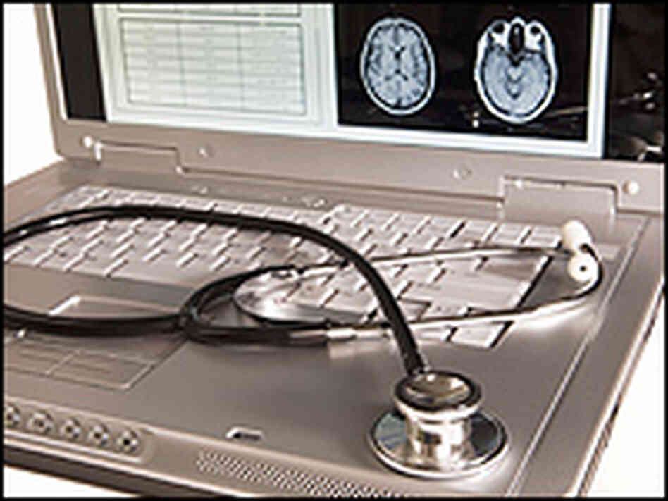 A computer screen shows medical charts for a patient, with a stethoscope lying across the keyboard. A computer screen shows medical charts for a patient, with a stethoscope lying across the keyboard.