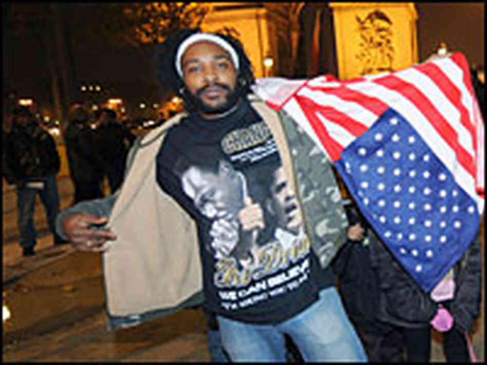 A supporter of Barack Obama celebrates his victory in Paris.