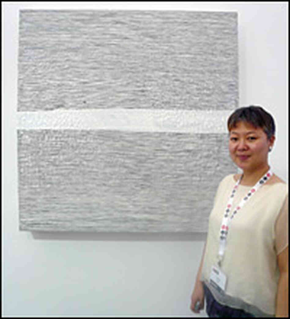 Gallery owner Yan Qing sold this work for $40,000 last  year; she is gambling on a recovery.