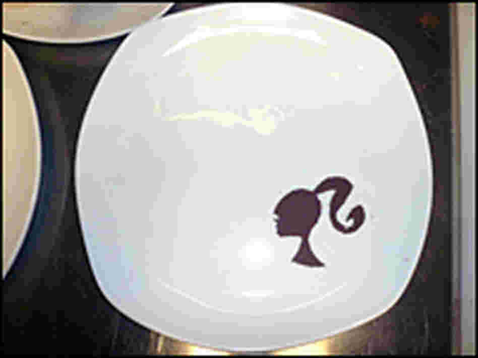 Even the plates in the Barbie restaurant are dusted with chocolate likenesses of the famous 11 1/2 i