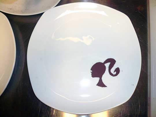Even the plates in the Barbie restaurant are dusted with chocolate likenesses of the famous 11 1/2 i