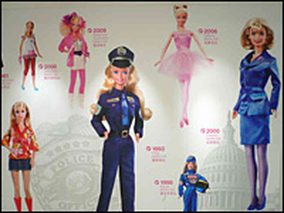 A mural decorating the House of Barbie shows the doll in her various occupations.