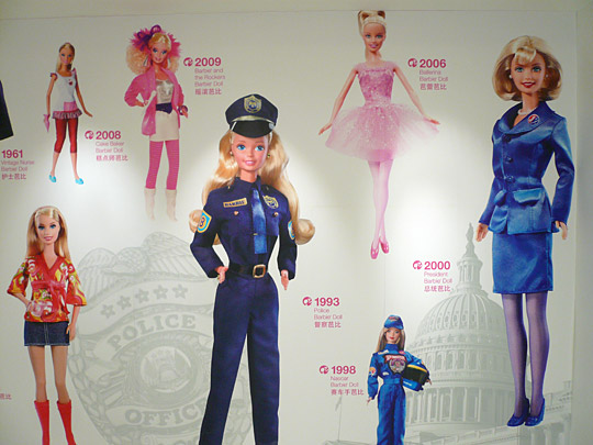 A mural decorating the House of Barbie shows the doll in her various occupations.