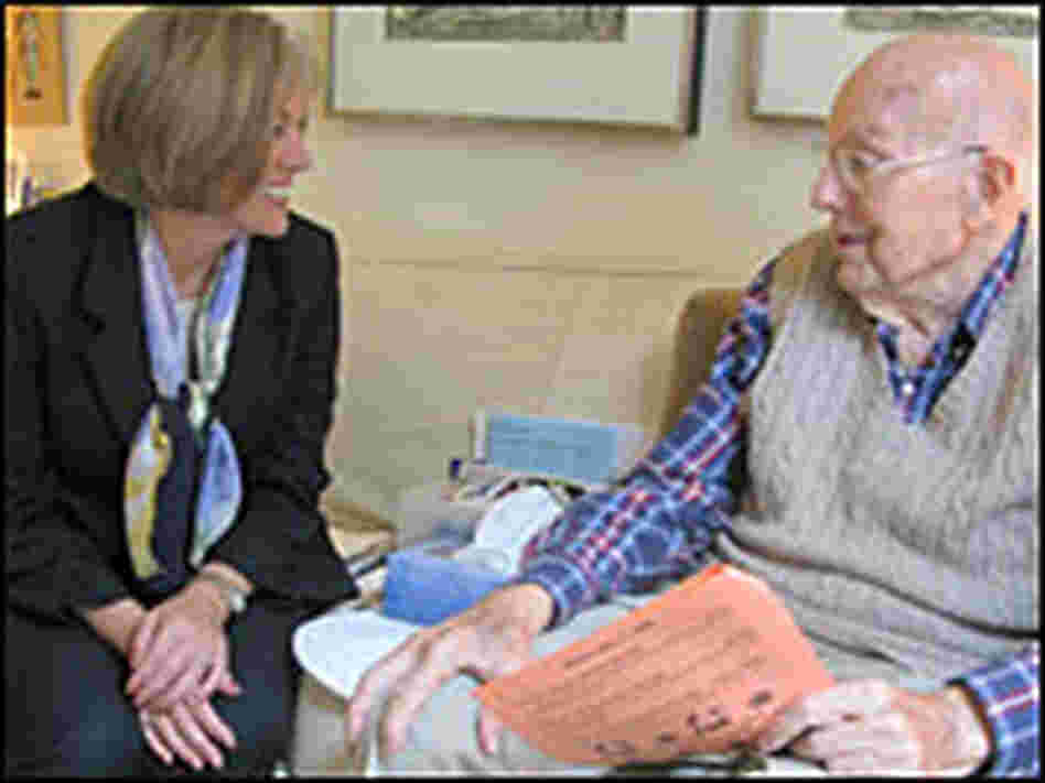 Patient advocate Dianne Savastano checks in with Bob Eckhoff in Brookline, Mass.