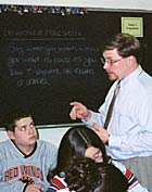 Teacher Andrew Lindsay leads a discussion