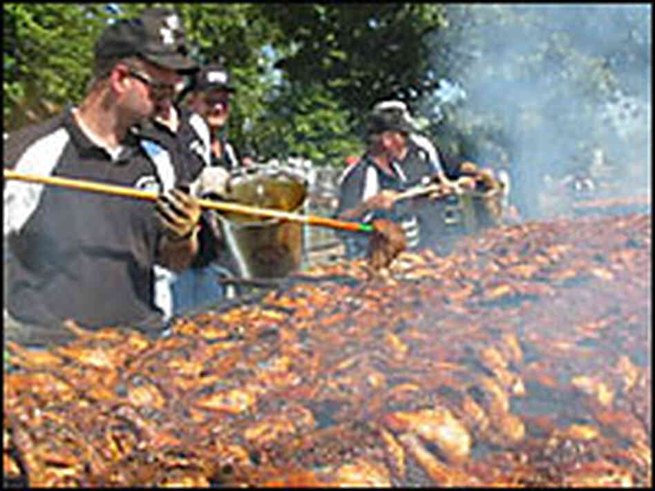 Men at work: The barbecue team at Blessed Mother Catholic Church in Owensboro, Ky. Men at work: The barbecue team at Blessed Mother Catholic Church in Owensboro, Ky.