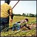 Members of the Ojibwe tribe pole through the rice reeds to begin harvesting the wild rice. Photo: Courtesy WELRP