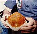 Water and coffee blob in beverage container during a space shuttle flight