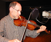 Paul Brown plays fiddle