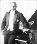 J. Rosamond Johnson by piano