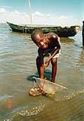 Kenyan boy with sailboat
