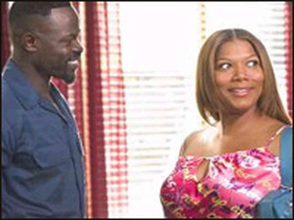 Djimon Hounsou and Queen Latifah in 'Beauty Shop.' Djimon Hounsou and Queen Latifah in 'Beauty Shop.'