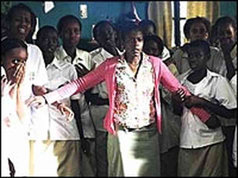 A teacher tries to protect her Tutsi students from Hutus in a scene from 'Sometimes in April' A teacher tries to protect her Tutsi students from Hutus in a scene from 'Sometimes in April'