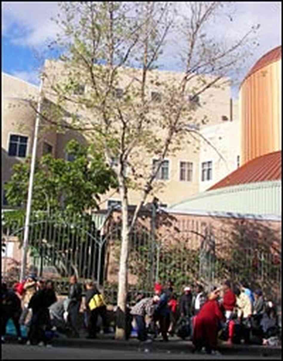 Homeless line up in the afternoon for space in an overnight shelter. Homeless line up in the afternoon for space in an overnight shelter.