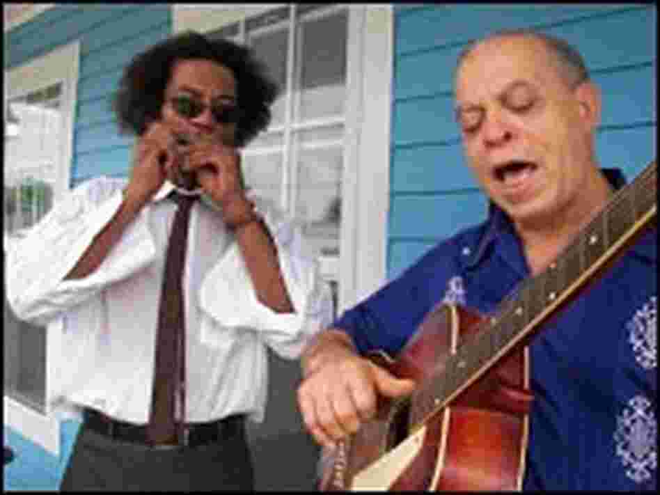 J.D. Hill, left and Deacon John play an improvised tune J.D. Hill, left and Deacon John play an improvised tune