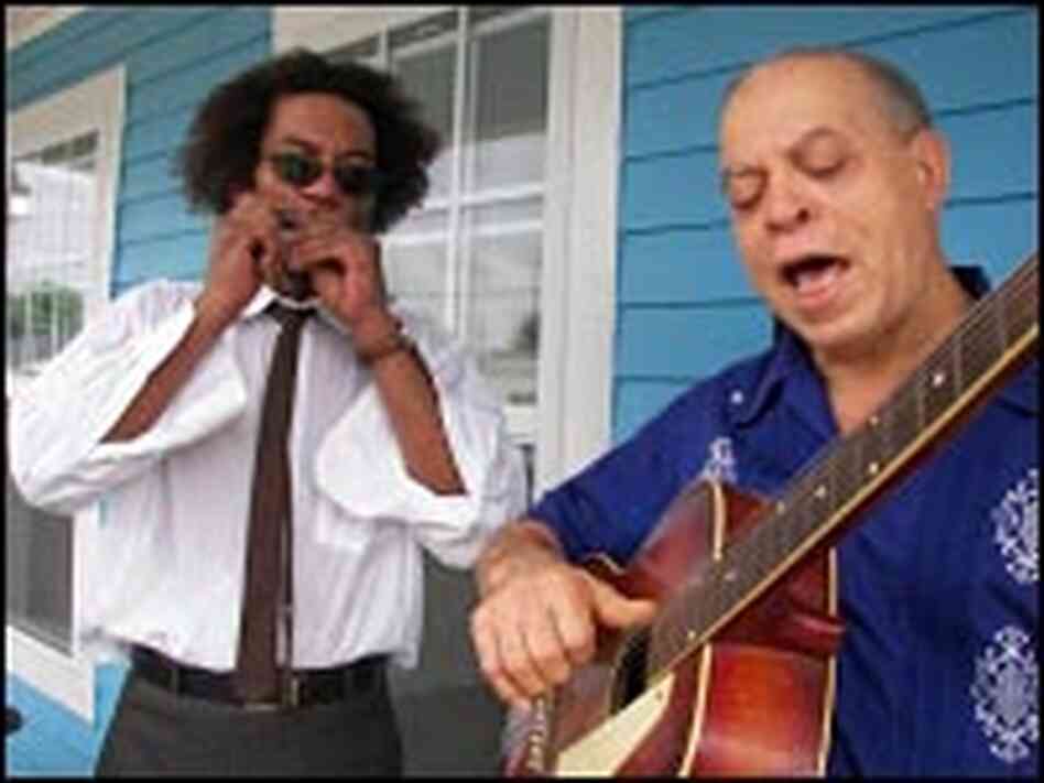 J.D. Hill, left and Deacon John play an improvised tune J.D. Hill, left and Deacon John play an improvised tune
