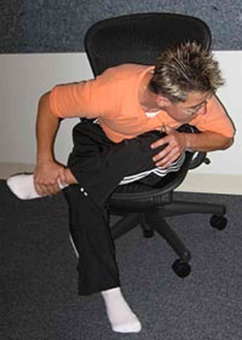 Ronda Wimmer does the same stretch on an office chair to prove exercise isn't limited to a gym. Ronda Wimmer does the same stretch on an office chair to prove exercise isn't limited to a gym.