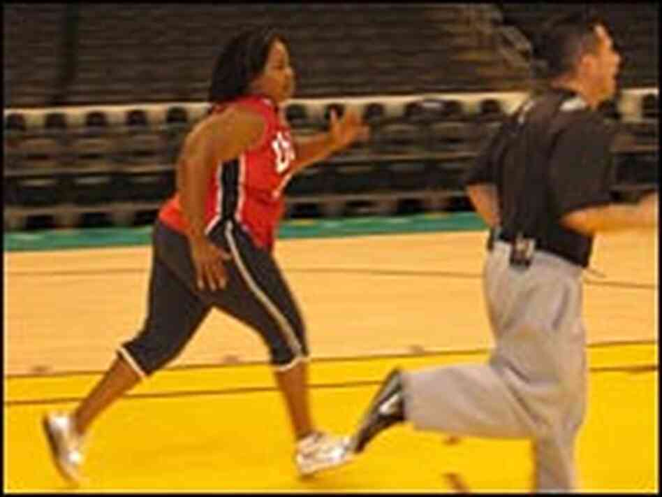 Farai Chideya and L.A. Sparks conditioning coach Bob Dominguez sprint down the hardwood. Farai Chideya and L.A. Sparks conditioning coach Bob Dominguez sprint down the hardwood.