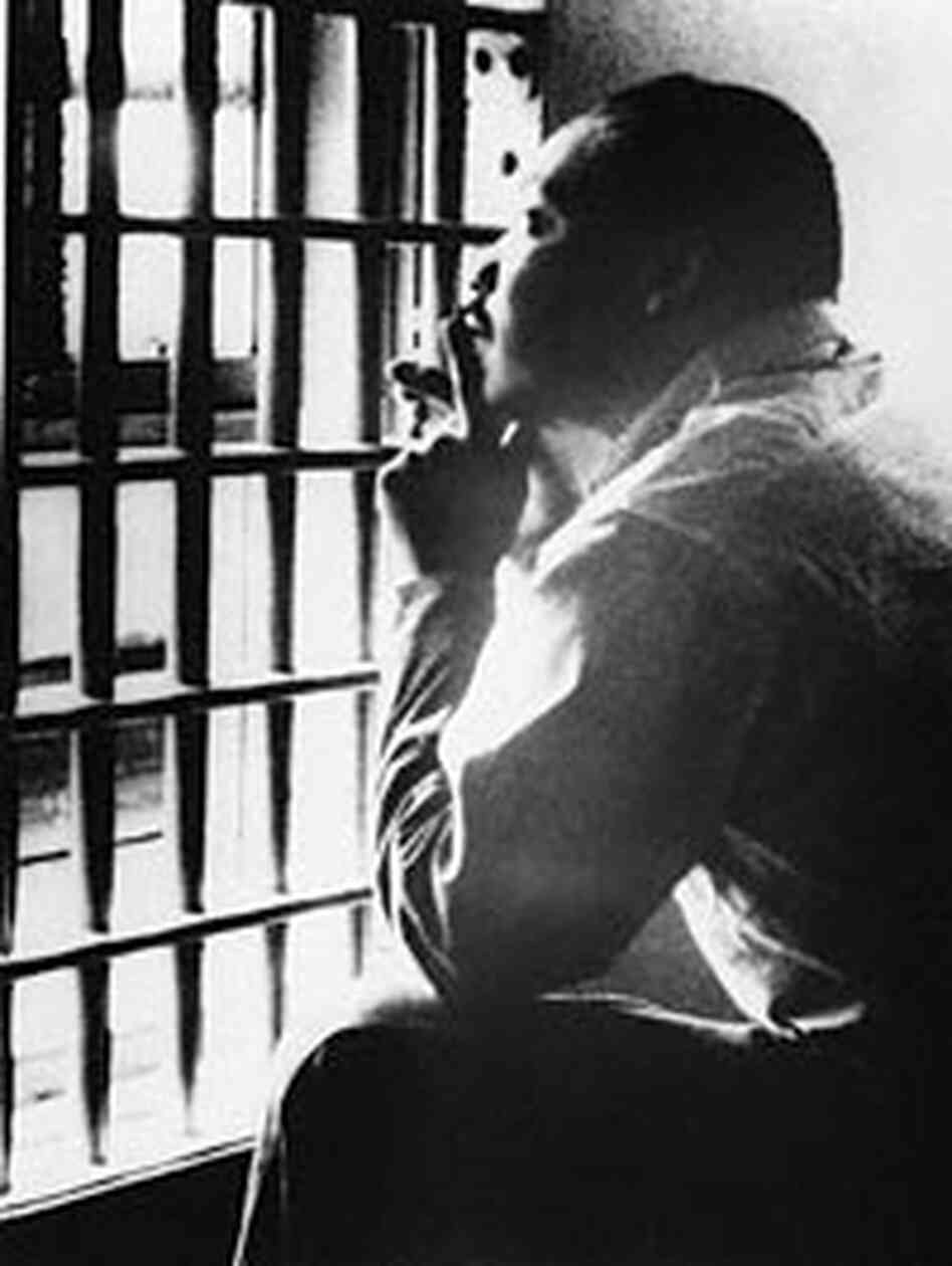 The Rev. Martin Luther King, Jr., sits in a jail cell, October 1967. The Rev. Martin Luther King, Jr., sits in a jail cell, October 1967.