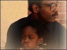 Detail from cover of 'The Pursuit of Happyness' Detail from cover of 'The Pursuit of Happyness'