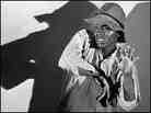 Original caption: 'A characteristic pose of the Sepia Fox Film comedian Stephen Fetchit.'
