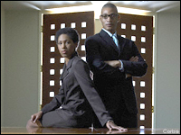 Man and woman in a boardroom