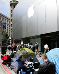 People waiting in line for an iPod.