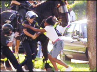 Crowd attacking car