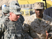 Maj. Gen. Gaskin (right) walks with Gen. David Petraeus.