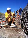 El Nino researcher Jerry Wellington drills core samples from an uplifted coral
