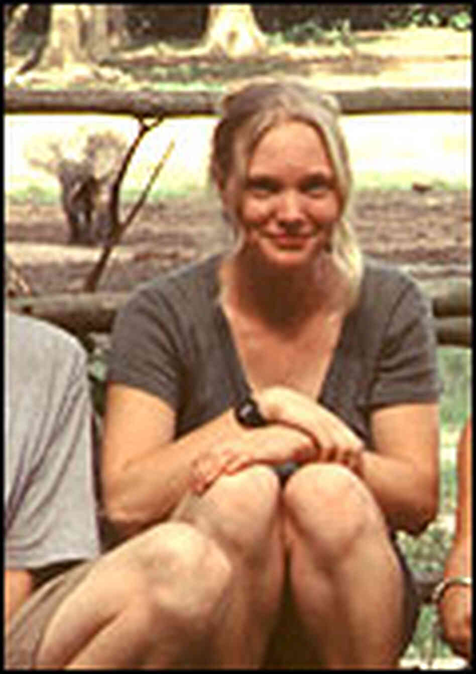 Research assistant Mya Thompson at the bai. An elephant can be seen in the background. Research assistant Mya Thompson at the bai. An elephant can be seen in the background.