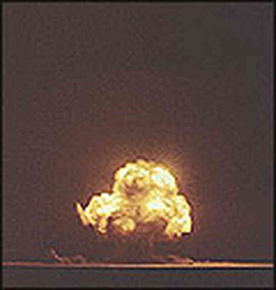 The cloud created as the first atomic bomb exploded at Trinity test site on July 16, 1945. The cloud created as the first atomic bomb exploded at Trinity test site on July 16, 1945.