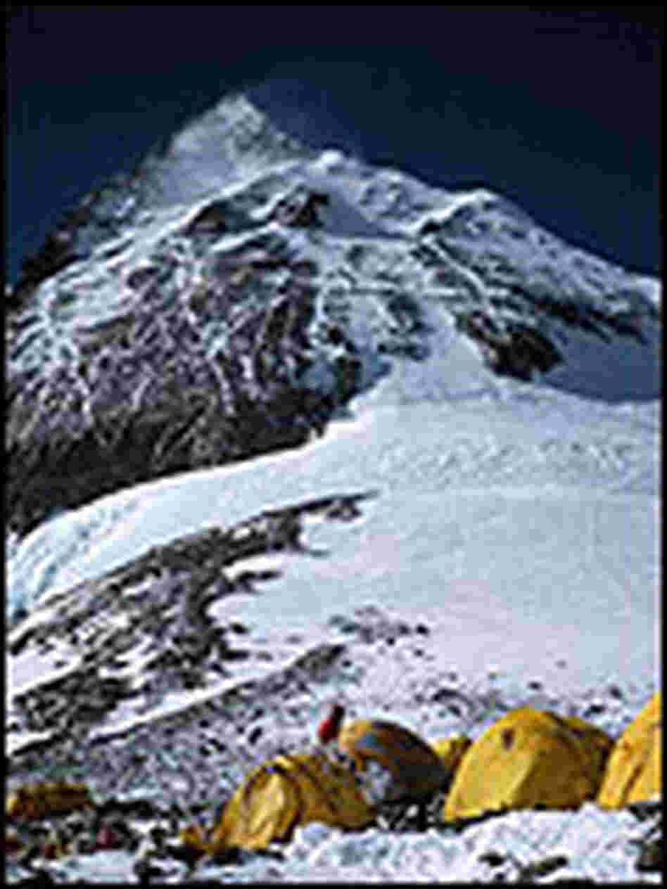 Three tents that are part of a camp below Everest's summit. Three tents that are part of a camp below Everest's summit.