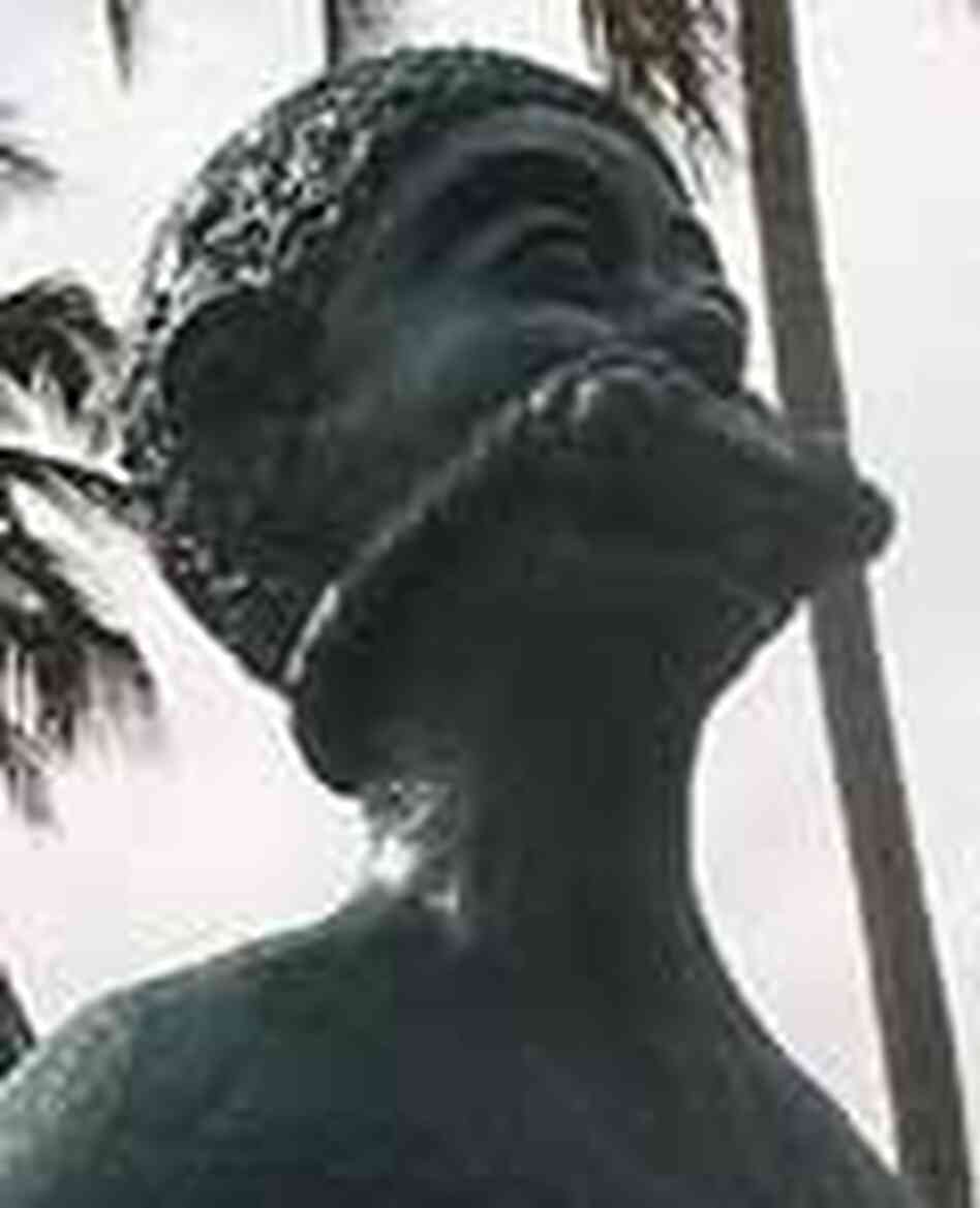 Statue of a bound slave woman. Statue of a bound slave woman.