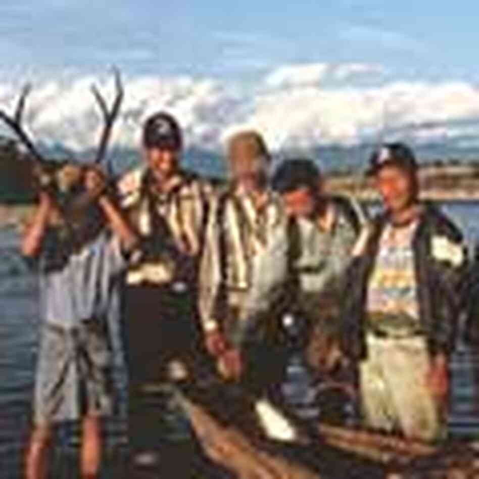 Five members of the so-called Tiger Team holding up confiscated animal parts. Five members of the so-called Tiger Team holding up confiscated animal parts.