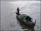 A fishing boat on the Tonle Sap River. A fishing boat on the Tonle Sap River.