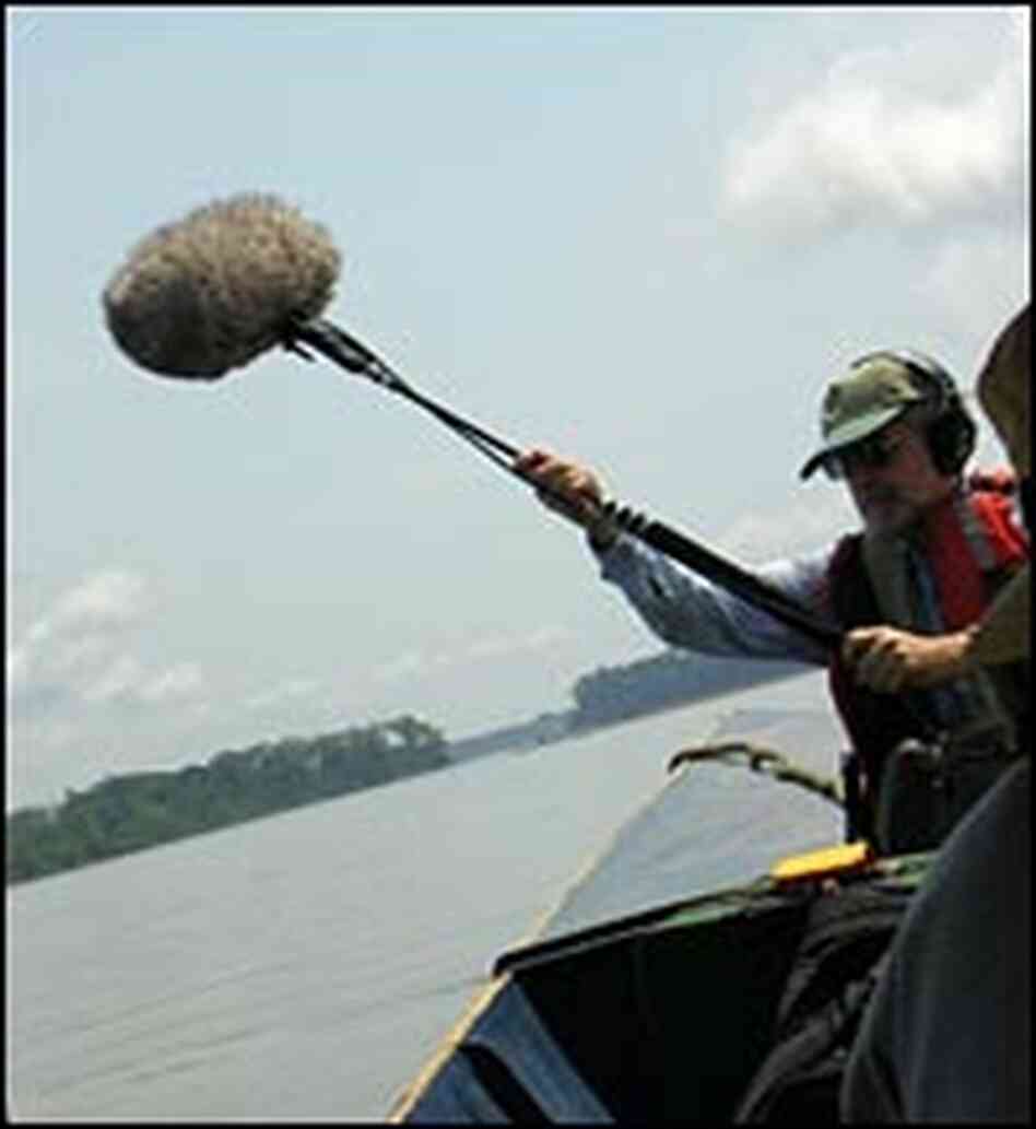 Leaving Coca, Ecuador in a steel canoe roaring down the Rio Napo Leaving Coca, Ecuador in a steel canoe roaring down the Rio Napo