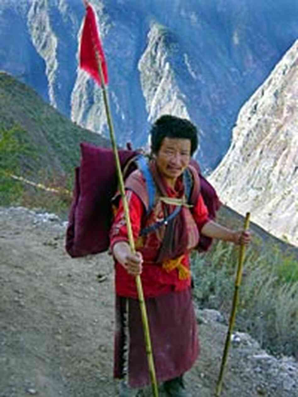 A Tibetan monk on the pilgrimage trail above Gebu.